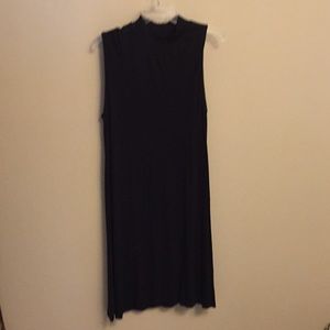 Black sleeveless knit dress with mock turtleneck